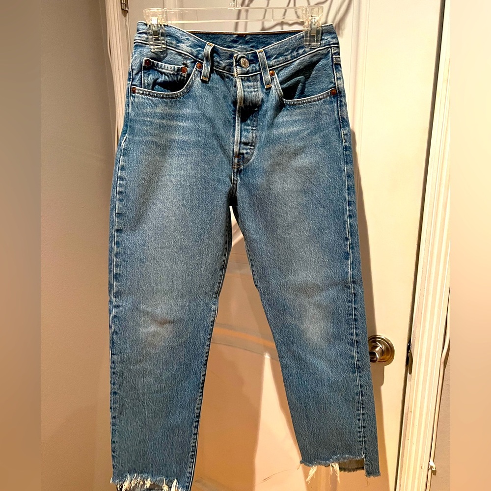 Levi’s 501 size 26 medium blue wash, raw hem